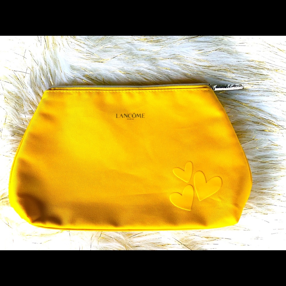 Yellow Lancôme pouch makeup